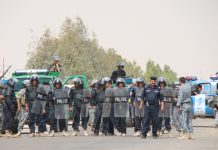 La Résistance iranienne demande aux forces US d’empêcher la police irakienne dentrer à Achraf La police irakienne devant les portes d'Achraf