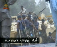 Forces r&eacute;pressives irakiennes, arm&eacute;es de gourdins, &agrave; Achraf