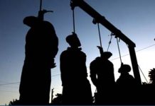 Photos – Quatre personnes exécutées en public à Chiraz en Iran