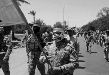 Les mercenaires irakiens du régime iranien commettent des crimes à Mossoul Les mercenaires irakiens du régime iranien commettent des crimes à Mossoul