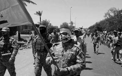 Les mercenaires irakiens du régime iranien commettent des crimes à Mossoul